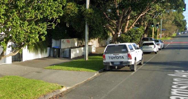 Concrete barriers blocking the footpath outside 92 Williamson Ave.